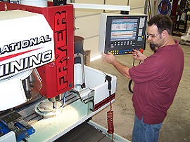 man working drill press
